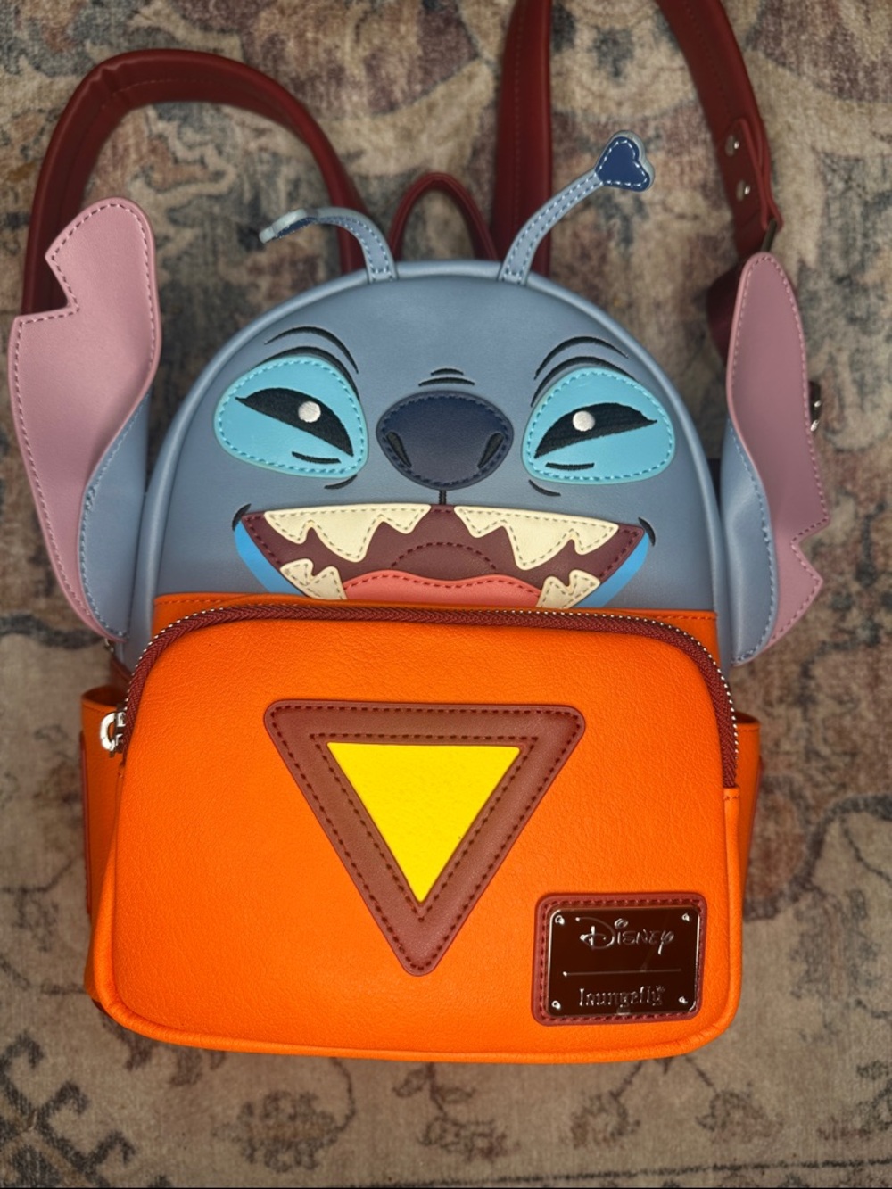 Loungefly Stitch Mini Backpack in Blue, Orange, Pink and Yellow